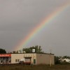 Richtiger Schatz auf dem Ende von Regenbogen